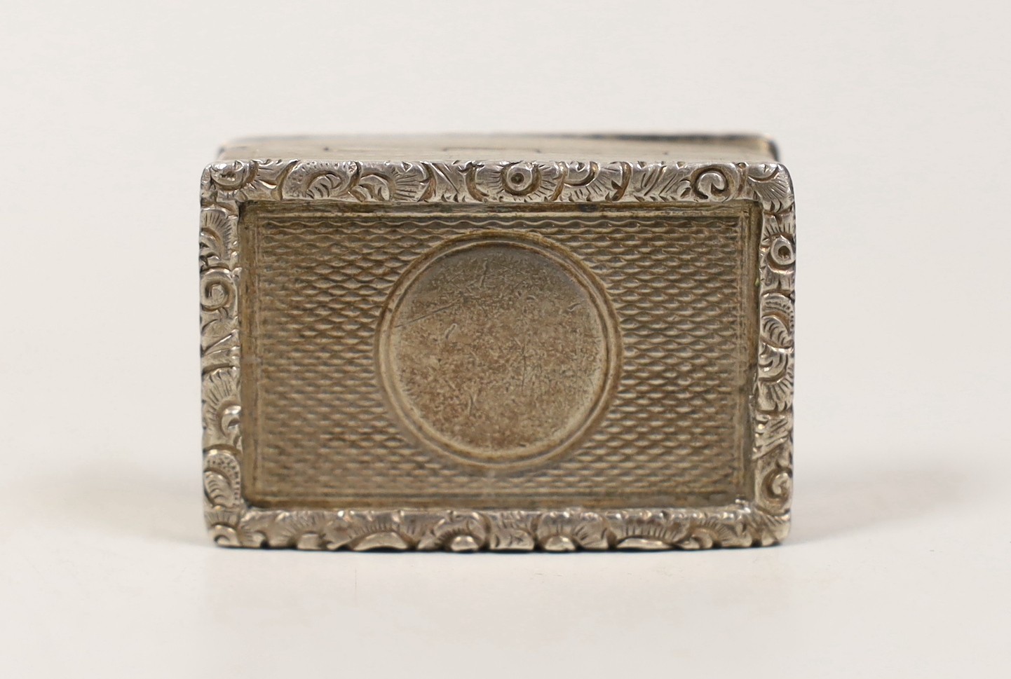 A late Victorian engine turned silver rectangular vinaigrette, George Unite, Birmingham, 1898, 41mm.